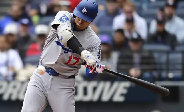 Los Angeles Dodgers' Shohei Ohtani swings during the fifth inning of a baseball game against the Cleveland Guardians, Wednesday, May 28, 2025, in Cleveland. (AP Photo/David Dermer)