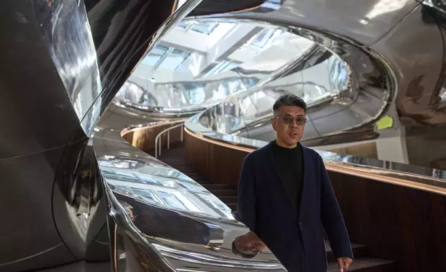 Architect Ma Yansong poses for a portrait during a press preview at the Fenix Migration Museum in Rotterdam, Netherlands, Wednesday, May 14, 2025. (AP Photo/Peter Dejong)