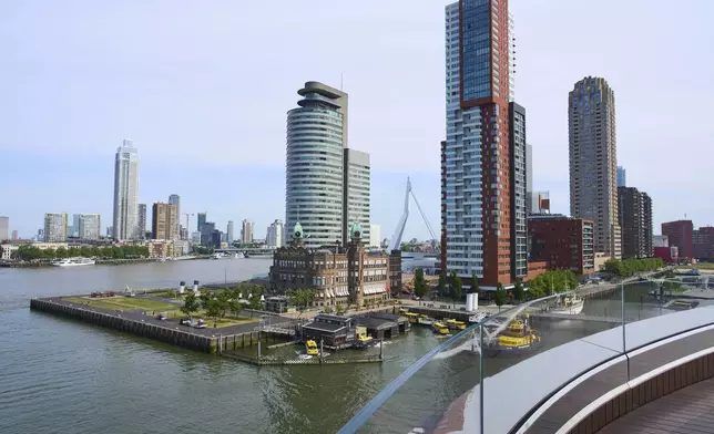 View of the harbour from the Fenix Migration Museum in Rotterdam, Netherlands, Wednesday, May 14, 2025. (AP Photo/Peter Dejong)