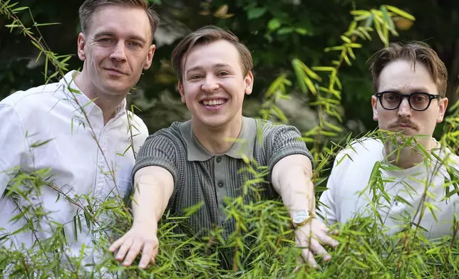 Swedish Eurovision contestants KAJ from Finland, Kevin Holmstrom, Jakob Norrgard and Axel Ahman, from left, pose for the camera before an interview with the Associated Press during the 69th Eurovision Song Contest week, in Basel, Switzerland, Thursday, May 15, 2025. (AP Photo/Martin Meissner)