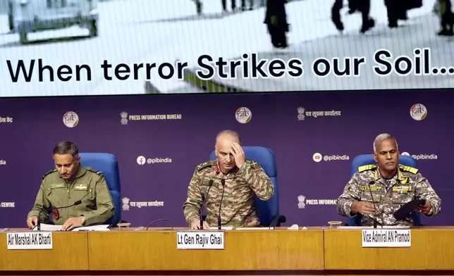 Left to right; Air Marshal AK Bharti, Director General of Military Operations Lt. Gen. Rajiv Ghai, Vice Admiral AN Pramod address a press conference in New Delhi, Sunday, May 11, 2025. (AP Photo/Manish Swarup)