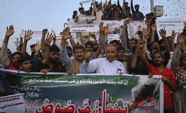 People chant slogans as they celebrate following India and Pakistan have reached a ceasefire deal, during a demonstration, in Multan, Pakistan, Saturday, May 10, 2025. (AP Photo/Asim Tanveer)