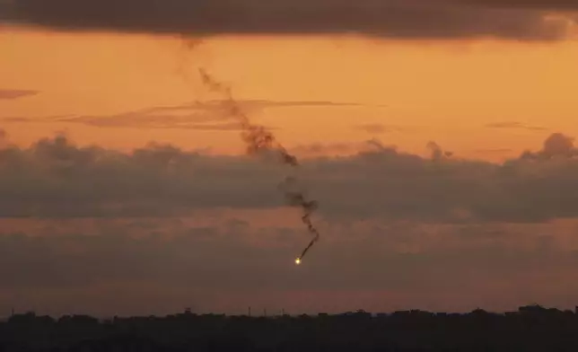 A flare fired by the Israeli army over the Gaza Strip is seen from southern Israel, Sunday, May 4, 2025. (AP Photo/Ariel Schalit)