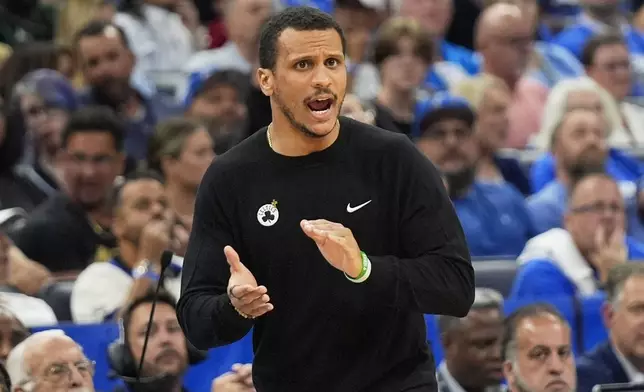 Boston Celtics head coach Joe Mazzulla encourages his players during the first half in Game 4 of a first-round NBA basketball playoff series against the Orlando Magic, Sunday, April 27, 2025, in Orlando, Fla. (AP Photo/John Raoux)
