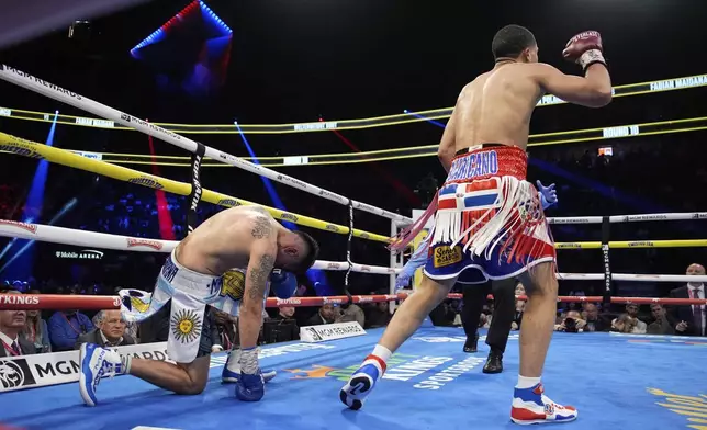 Rohan Polanco knocks down Fabian Maidana in a welterweight boxing match Sunday, May 4, 2025, in Las Vegas. (AP Photo/John Locher)