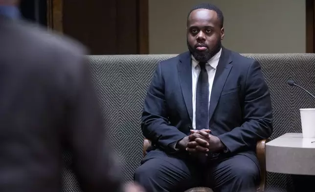 Former Memphis Police Department officer Tadarrius Bean, one of three former officers charged with fatally beating Tyre Nichols in 2023, takes the stand to decline to testify on his own behalf during the sixth day of the trial, Saturday, May 3, 2025, in Memphis, Tenn. (Chris Day/The Commercial Appeal via AP, Pool)