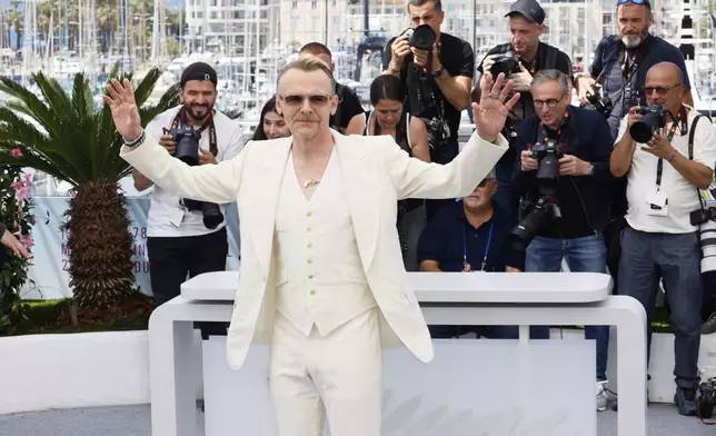 Simon Pegg poses for photographers during the photo call for the film 'Mission: Impossible – The Final Reckoning' at the 78th international film festival, Cannes, southern France, Wednesday, May 14, 2025. (Photo by Joel C Ryan/Invision/AP)