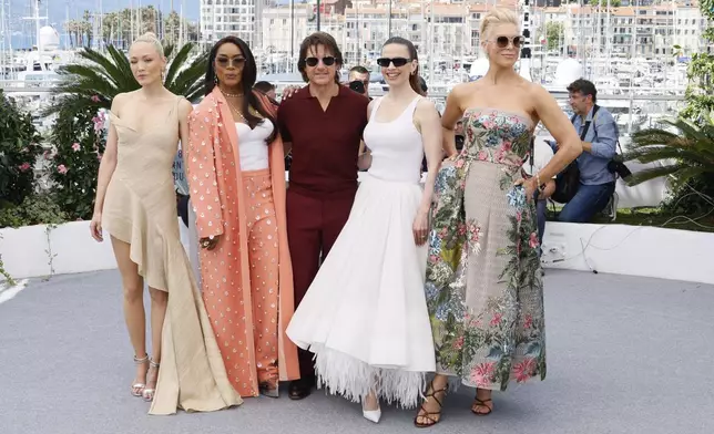 Pom Klementieff, from left, Angela Bassett, Tom Cruise, Hayley Atwell, and Hannah Waddingham pose for photographers during the photo call for the film 'Mission: Impossible – The Final Reckoning' at the 78th international film festival, Cannes, southern France, Wednesday, May 14, 2025. (Photo by Joel C Ryan/Invision/AP)
