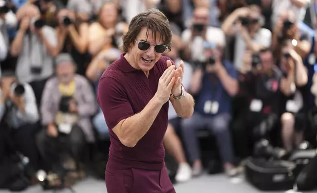 Tom Cruise poses for photographers during the photo call for the film 'Mission: Impossible – The Final Reckoning' at the 78th international film festival, Cannes, southern France, Wednesday, May 14, 2025. (Photo by Scott A Garfitt/Invision/AP)
