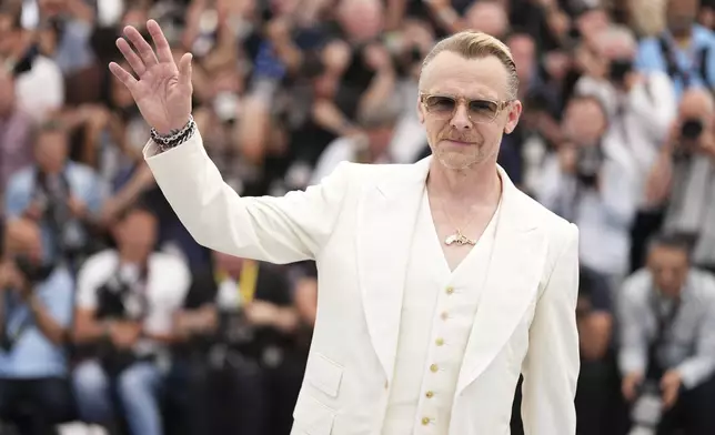 Simon Pegg poses for photographers during the photo call for the film 'Mission: Impossible – The Final Reckoning' at the 78th international film festival, Cannes, southern France, Wednesday, May 14, 2025. (Photo by Scott A Garfitt/Invision/AP)