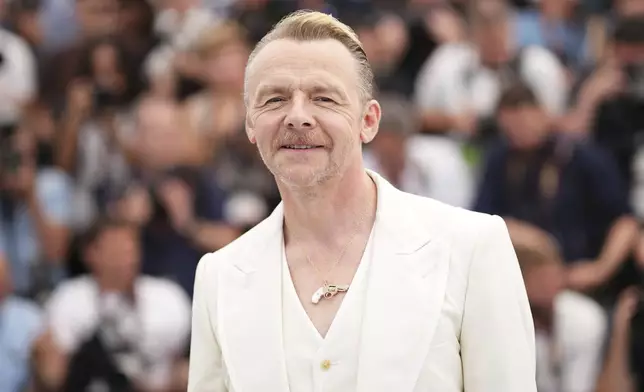 Simon Pegg poses for photographers during the photo call for the film 'Mission: Impossible – The Final Reckoning' at the 78th international film festival, Cannes, southern France, Wednesday, May 14, 2025. (Photo by Scott A Garfitt/Invision/AP)