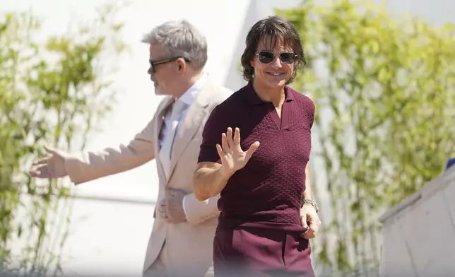 Tom Cruise arrives for the photo call for the film 'Mission: Impossible – The Final Reckoning' at the 78th international film festival, Cannes, southern France, Wednesday, May 14, 2025. (AP Photo/Natacha Pisarenko)