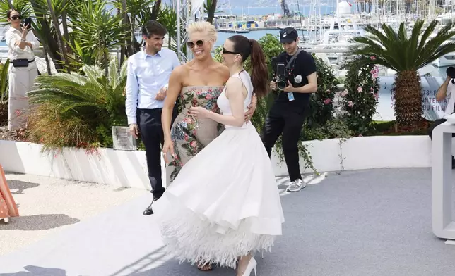Hannah Waddingham, left, and Hayley Atwell pose for photographers during the photo call for the film 'Mission: Impossible – The Final Reckoning' at the 78th international film festival, Cannes, southern France, Wednesday, May 14, 2025. (Photo by Joel C Ryan/Invision/AP)