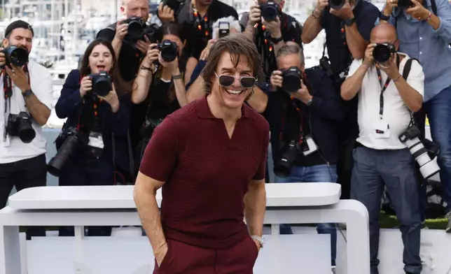 Tom Cruise poses for photographers during the photo call for the film 'Mission: Impossible – The Final Reckoning' at the 78th international film festival, Cannes, southern France, Wednesday, May 14, 2025. (Photo by Joel C Ryan/Invision/AP)