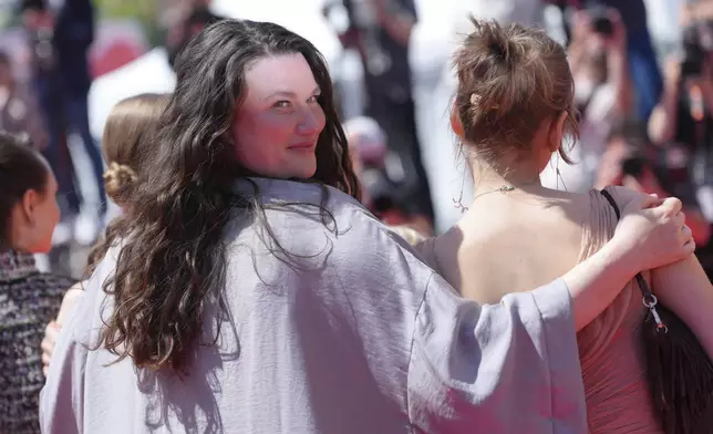 Director Mascha Schilinski poses for photographers upon arrival at the premiere of the film 'Sound of Falling' at the 78th international film festival, Cannes, southern France, Wednesday, May 14, 2025. (Photo by Lewis Joly/Invision/AP)