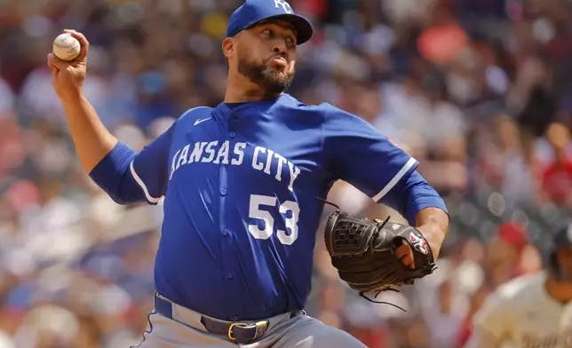 Kansas City Royals relief pitcher Carlos Estevez throws to the Minnesota Twins in the eighth inning of a baseball game Sunday, May 25, 2025, in Minneapolis. (AP Photo/Bruce Kluckhohn)
