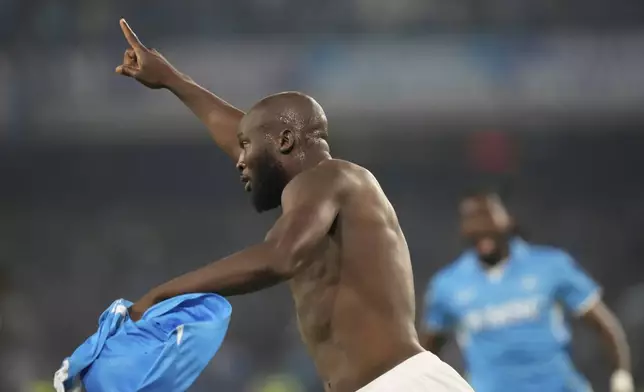 Napoli's Romelu Lukaku celebrates after scoring his side's 2nd goal during the Italian Serie A soccer match between Napoli and Cagliari at the Diego Maradona stadium in Naples, Italy, Friday, May 23, 2025. (AP Photo/Gregorio Borgia)