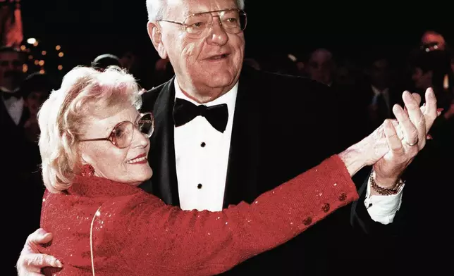 FILE - Gov. George Ryan dances with his wife, Lura Lynn, at his gubernatorial inaugural ball in Springfield, Ill., on Jan. 12, 1999. (The (Kankakee) Daily Journal via AP, File)