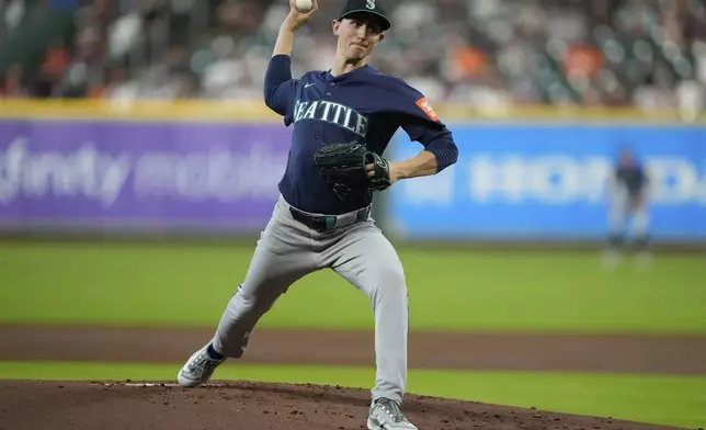 Seattle Mariners starting pitcher George Kirby throws during the first inning of a baseball game against the Houston Astros in Houston, Thursday, May 22, 2025. (AP Photo/Ashley Landis)