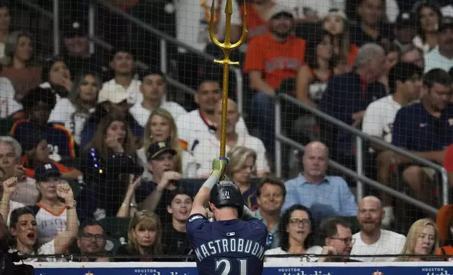 Seattle Mariners' Miles Mastrobuoni celebrates after hitting a home run during the fifth inning of a baseball game against the Houston Astros in Houston, Friday, May 23, 2025. (AP Photo/Ashley Landis)