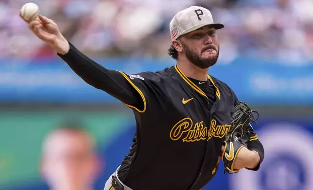 Pittsburgh Pirates starting pitcher Paul Skenes delivers during the first inning of a baseball game against the Philadelphia Phillies, Sunday, May 18, 2025, in Philadelphia. (AP Photo/Chris Szagola)
