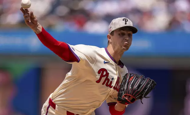 Philadelphia Phillies starting pitcher Mick Abel delivers during the first inning of a baseball game against the Pittsburgh Pirates, Sunday, May 18, 2025, in Philadelphia. (AP Photo/Chris Szagola)