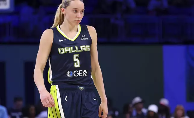 CORRECTS YEAR TO 2025 NOT 2020 - Dallas Wings guard Paige Bueckers (5) stands on the court during a Minnesota Lynx foul shot in a WNBA basketball game Friday, May 16, 2025, in Arlington, Texas. (AP Photo/Richard W. Rodriguez)