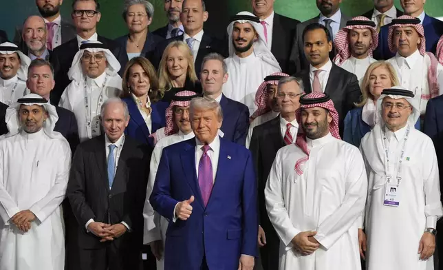 President Donald Trump and Saudi Crown Prince Mohammed bin Salman pose for a photo at the Saudi-U.S. Investment Forum at the King Abdulaziz International Conference Center in Riyadh, Saudi Arabia, Tuesday, May 13, 2025. (AP Photo/Alex Brandon)