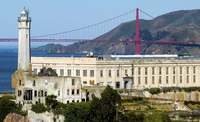 The Golden Gate Bridge stands behind Alcatraz Island on Monday, May 5, 2025, in San Francisco. (AP Photo/Noah Berger)