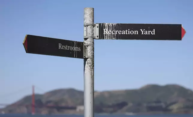 A sign points to the recreation yard on Alcatraz Island Monday, May 5, 2025, in San Francisco. (AP Photo/Jed Jacobsohn)