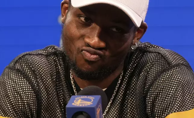 Golden State Warriors forward Jonathan Kuminga speaks during a news conference at the NBA basketball team's facility in San Francisco, Thursday, May 15, 2025. (AP Photo/Jeff Chiu)