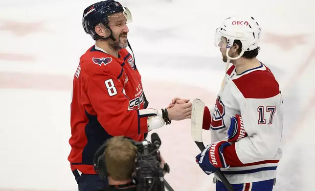 Washington Capitals left wing Alex Ovechkin (8) shakes hands with Montreal Canadiens right wing Josh Anderson (17) after Game 5 of a first-round NHL hockey playoff series Wednesday, April 30, 2025, in Washington. (AP Photo/Nick Wass)