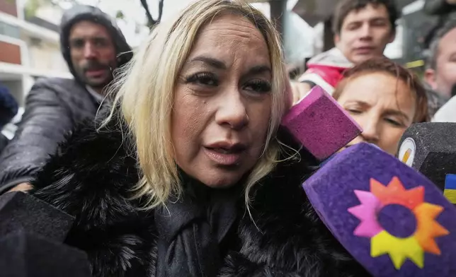 Veronica Ojeda, ex partner of the late soccer star Diego Maradona, arrives at court for a hearing in the trial of health professionals accused of negligence in his death, in San Isidro on the outskirts of Buenos Aires, Argentina, Tuesday, May 27, 2025. (AP Photo/Gustavo Garello)