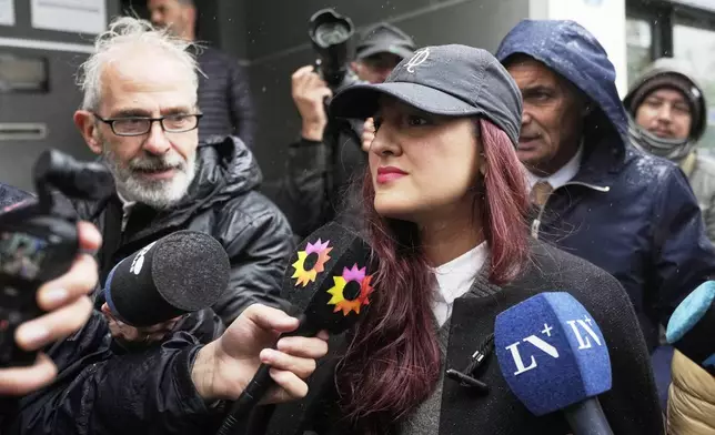 Jana Maradona, daughter of the late soccer star Diego Maradona, arrives at court for a hearing in the trial of health professionals accused of negligence in his death, in San Isidro on the outskirts of Buenos Aires, Argentina, Tuesday, May 27, 2025. (AP Photo/Gustavo Garello)