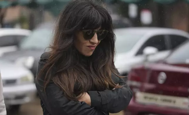 Gianinna Maradona, daughter of the late soccer star Diego Maradona, arrives at court for a hearing in the trial of health professionals accused of negligence in his death, in San Isidro on the outskirts of Buenos Aires, Argentina, Tuesday, May 27, 2025. (AP Photo/Gustavo Garello)