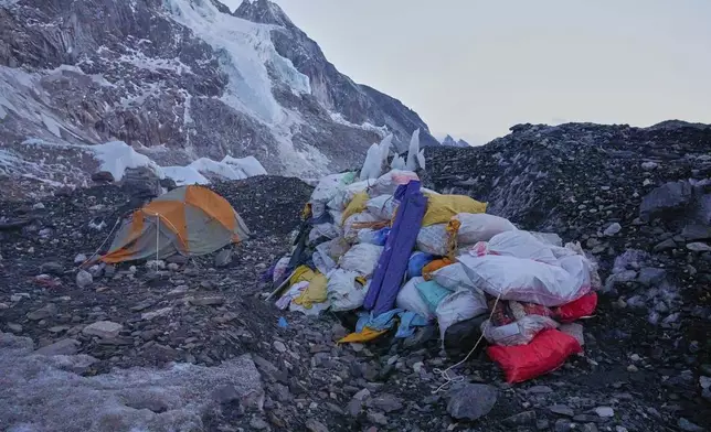 Garbage is piled up at a waste collection center at Everest Base Camp in Nepal, May 12, 2025. (AP Photo/Pasang Rinzee Sherpa)