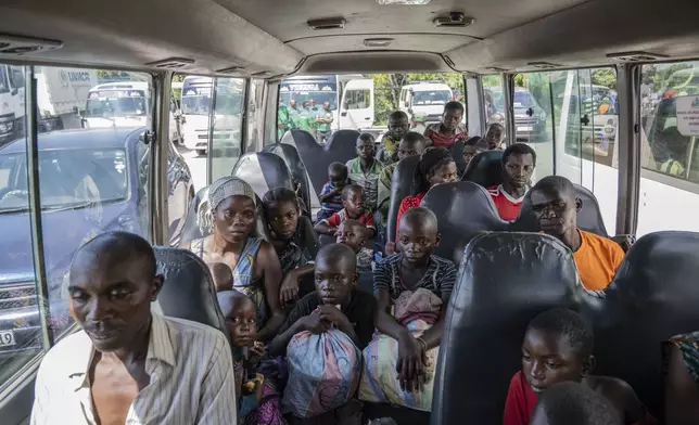 Rwandan refugees who were living in eastern Congo since the 1994 Rwanda genocide are repatriated by bus from Goma, Democratic Republic of the Congo, on Saturday, May 17, 2025. (AP Photo/Moses Sawasawa)