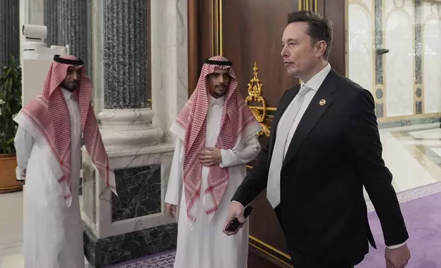 Elon Musk, departs a lunch between President Donald Trump and Saudi Crown Prince Mohammed bin Salman at the Royal Palace in Riyadh, Saudi Arabia, Tuesday, May 13, 2025. (AP Photo/Alex Brandon)