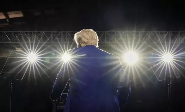 President Donald Trump on stage at the Al Udeid Air Base, Thursday, May 15, 2025, in Doha, Qatar. (AP Photo/Alex Brandon)