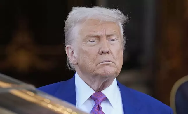 President Donald Trump looks on as he leaves the Royal Palace after a signing ceremony with Saudi Crown Prince Mohammed bin Salman in Riyadh, Saudi Arabia, Tuesday, May 13, 2025. (AP Photo/Alex Brandon)