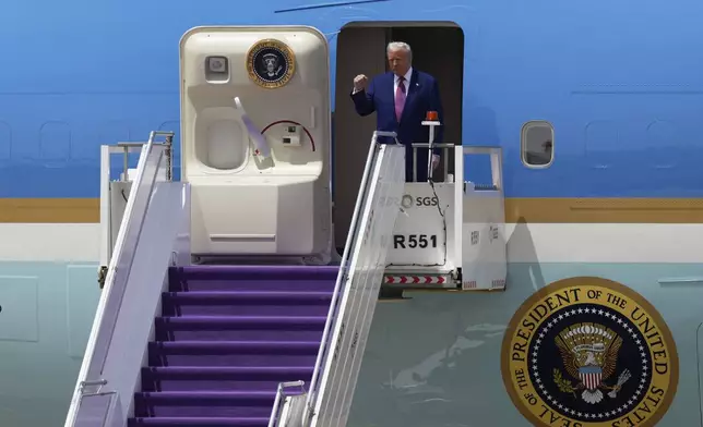 President Donald Trump arrives on Air Force One at King Khalid International Airport Royal Terminal in Riyadh, Saudi Arabia, Tuesday, May 13, 2025 . (AP Photo/Alex Brandon)