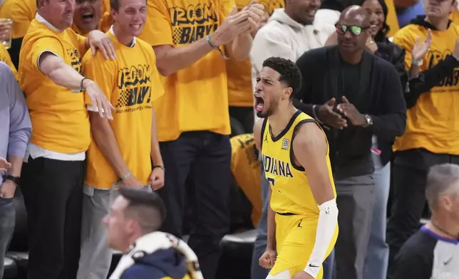 Indiana Pacers guard Tyrese Haliburton celebrates during the first half of Game 3 of the Eastern Conference finals of the NBA basketball playoffs against the New York Knicks Sunday, May 25, 2025, in Indianapolis. (AP Photo/AJ Mast)