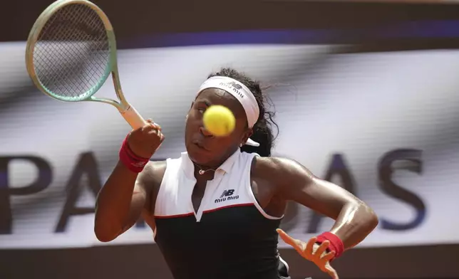United States' Coco Gauff returns the ball to Mirra Andreeva during their tennis match at the Italian Open at the Foro Italico, in Rome, Wednesday, May 14, 2025.(AP Photo/Alessandra Tarantino)