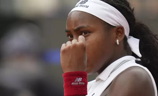 United States' Coco Gauff makes a fist in celebration after making a point against Mirra Andreeva during their tennis match at the Italian Open at the Foro Italico, in Rome, Wednesday, May 14, 2025.(AP Photo/Alessandra Tarantino)