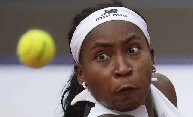 United States' Coco Gauff eyes the ball during her tennis match against Mirra Andreeva at the Italian Open at the Foro Italico, in Rome, Wednesday, May 14, 2025.(AP Photo/Alessandra Tarantino)