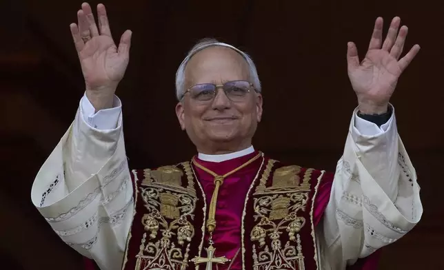 Newly elected Pope Leo XIV appears at the balcony of St. Peter's Basilica at the Vatican, Thursday, May 8, 2025. (AP Photo/Andrew Medichini)