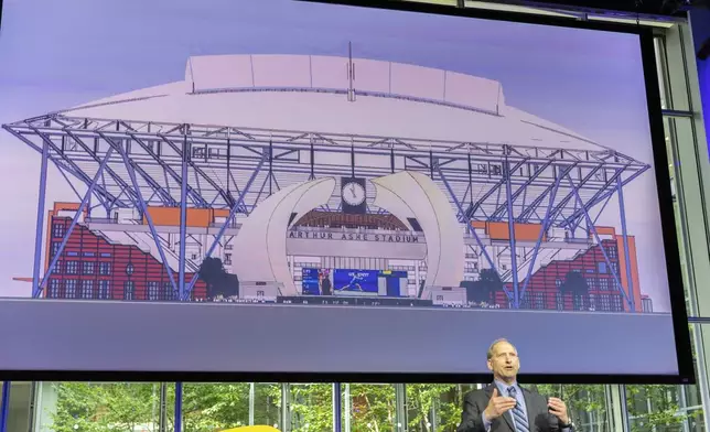 Danny Zausner, Chief Operating Officer of USTA speaks at a news conference announcing the redevelopment of Arthur Ashe Stadium and the USTA Billie Jean King National Tennis Center, Monday, May 19, 2025, in New York. (AP Photo/Stefan Jeremiah)