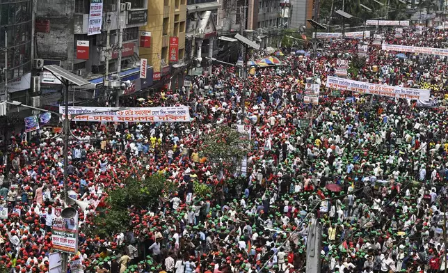 Activists from the Bangladesh Nationalist Party (BNP) gather on the streets calling for a general election in December, in Dhaka, Bangladesh, Wednesday, May 28, 2025. (AP Photo/Mahmud Hossain Opu)