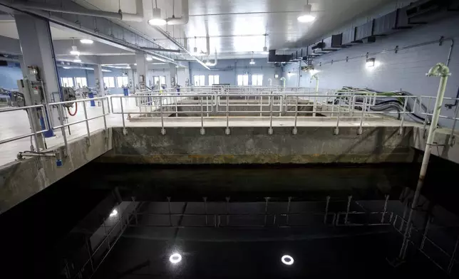 Water is processed through carbon filters inside large reservoirs designed to remove a forever chemical, known as PFAS at the Sweeney Water Treatment Plant in Wilmington, N.C., Monday, April 28, 2025. (AP Photo/Ben McKeown)