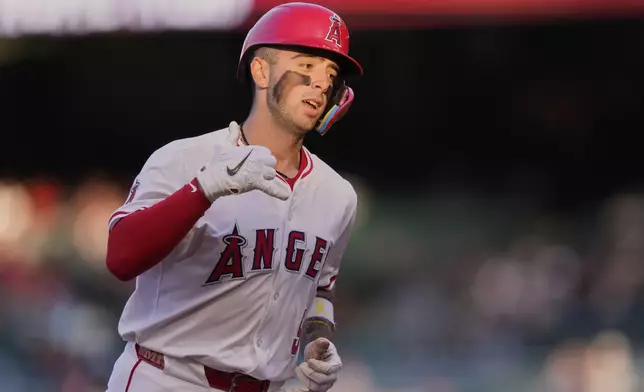 Los Angeles Angels' Zach Neto gestures after hitting a solo home run during the first inning of a baseball game against the Detroit Tigers, Friday, May 2, 2025, in Anaheim, Calif. (AP Photo/Mark J. Terrill)